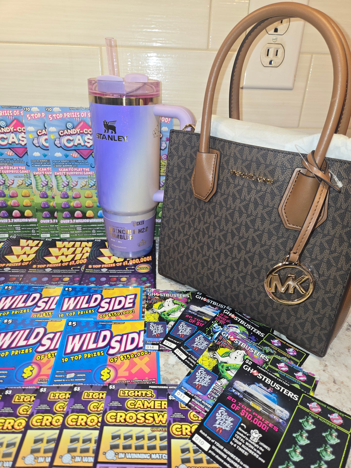 $200 Lotto's, wicked Purple Stanley, brown Michael Kors serial # 34474