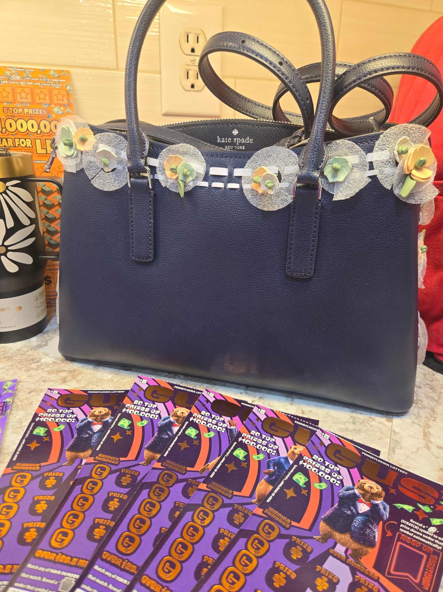 $250 Lotto's, Wild Blooms Stanley, flower Kate Spade purse serial # 55357