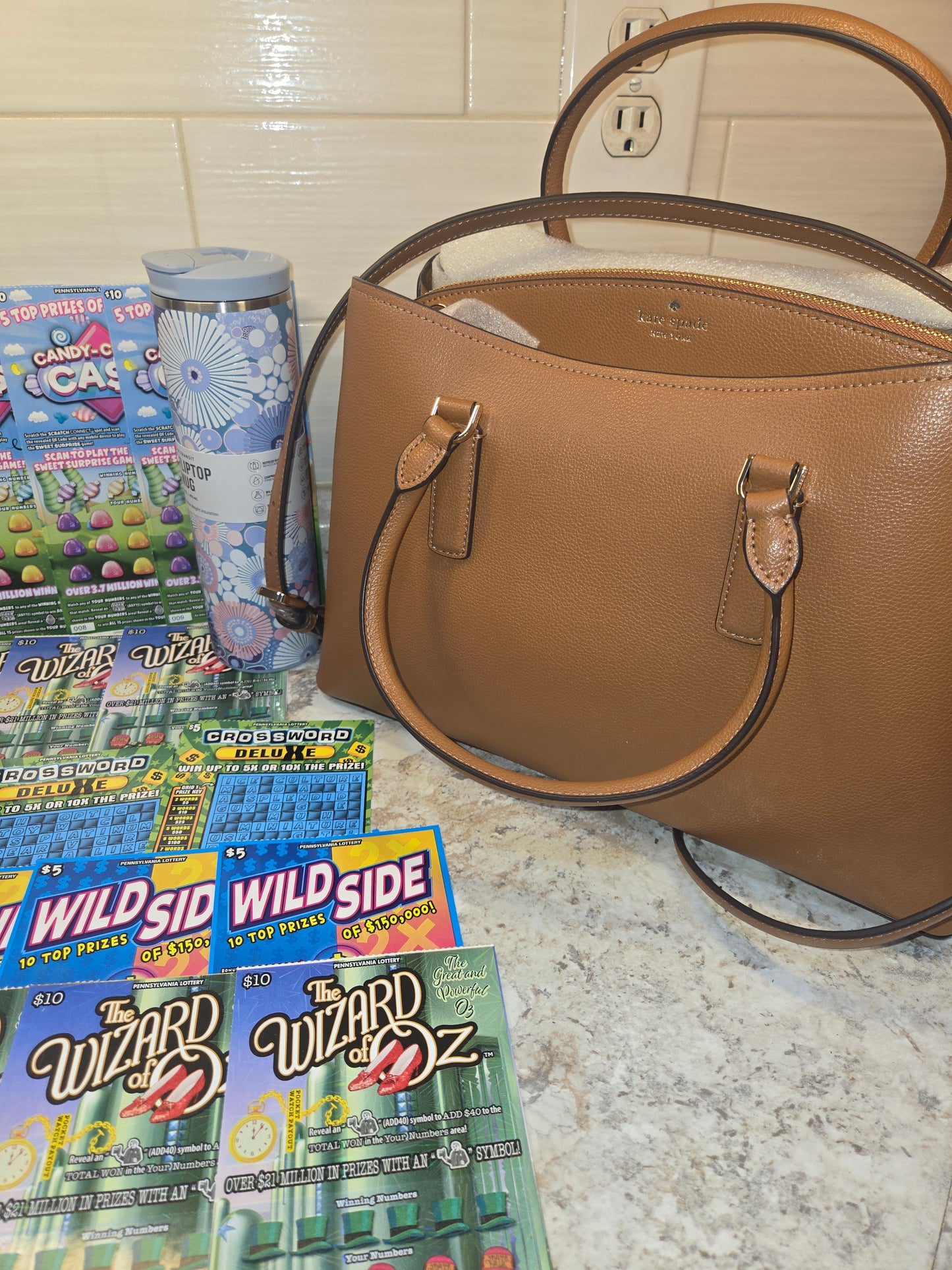 $200 Lotto's, Blue Wildflower Stanley, brown Kate Spade serial # 14307